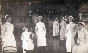 Nellie Jowett sat far right wearing glasses.  Ward F25, 1921